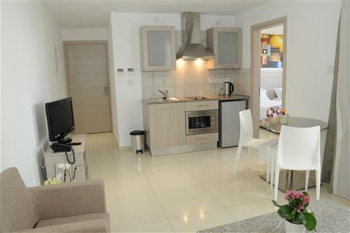 Frixos Hotel Apartments Living Room - Kitchen