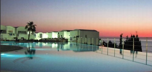 Theo Sunset Bay Village Swimming Pool at night