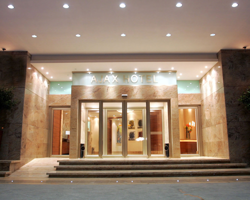 Ajax Hotel Entrance At Night
