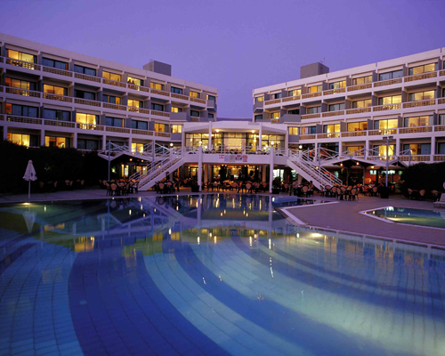 Paphian Bay Hotel Hotel And Pool Evening View