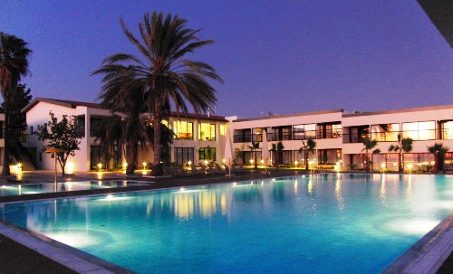 Pafiana Heights Hotel Swimming Pool by night 