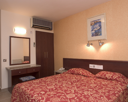 Alva Hotel Apartments Renovated Bedroom