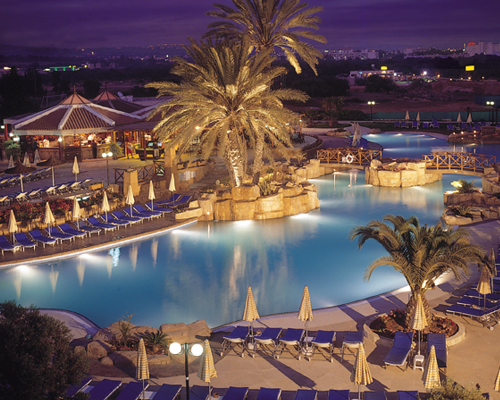 Olympic Lagoon Resort Pool At Night